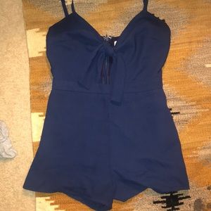 Blue romper with tie in front